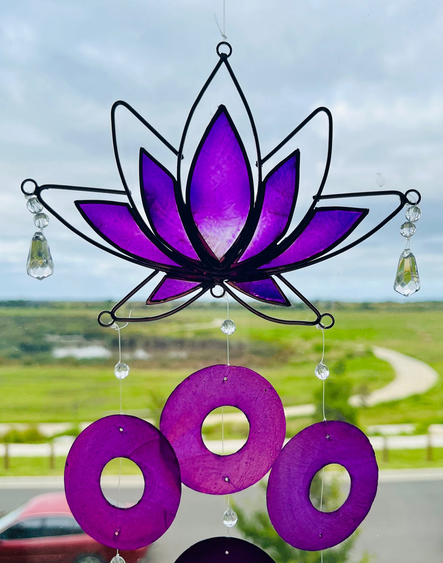 
                  
                    Capiz Lotus Flower Wind Chime
                  
                