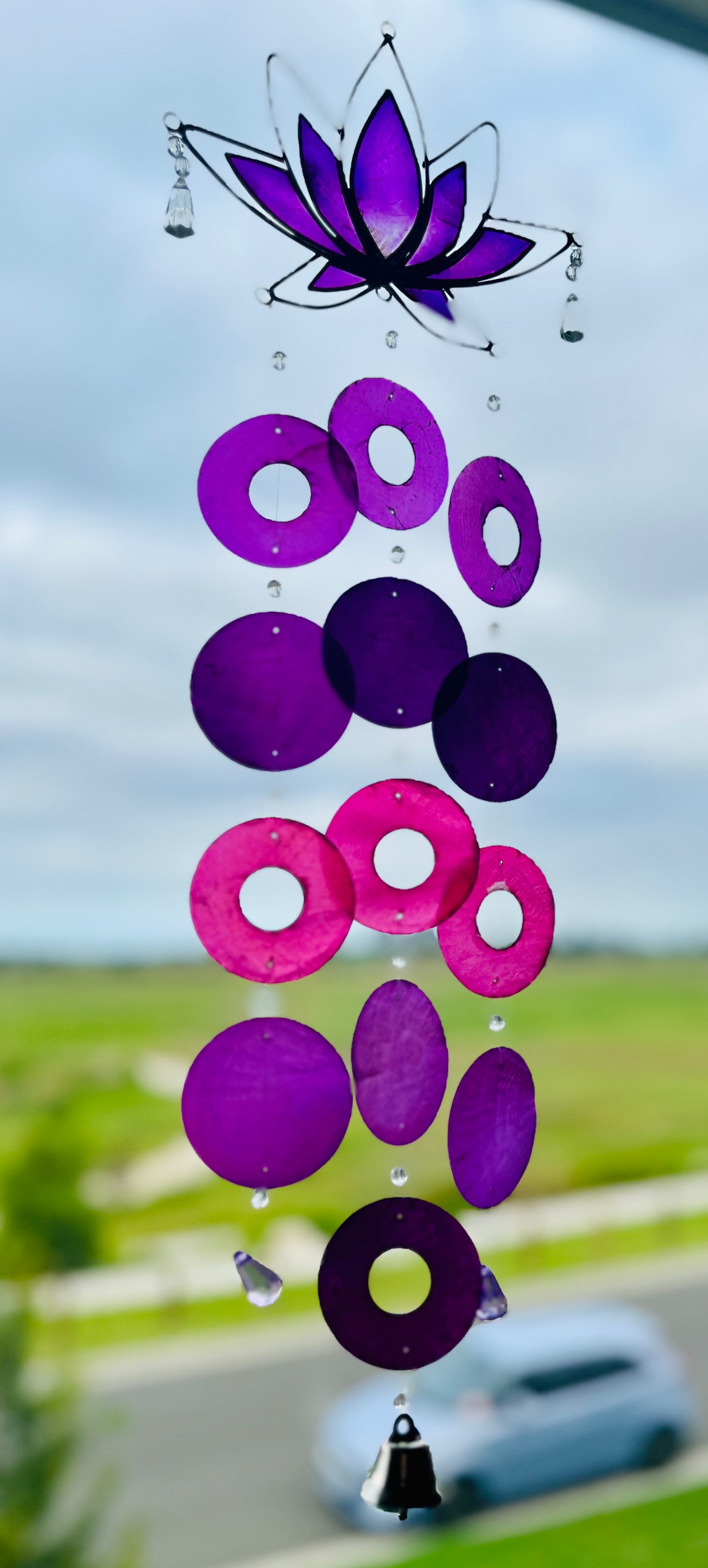 
                  
                    Capiz Lotus Flower Wind Chime
                  
                