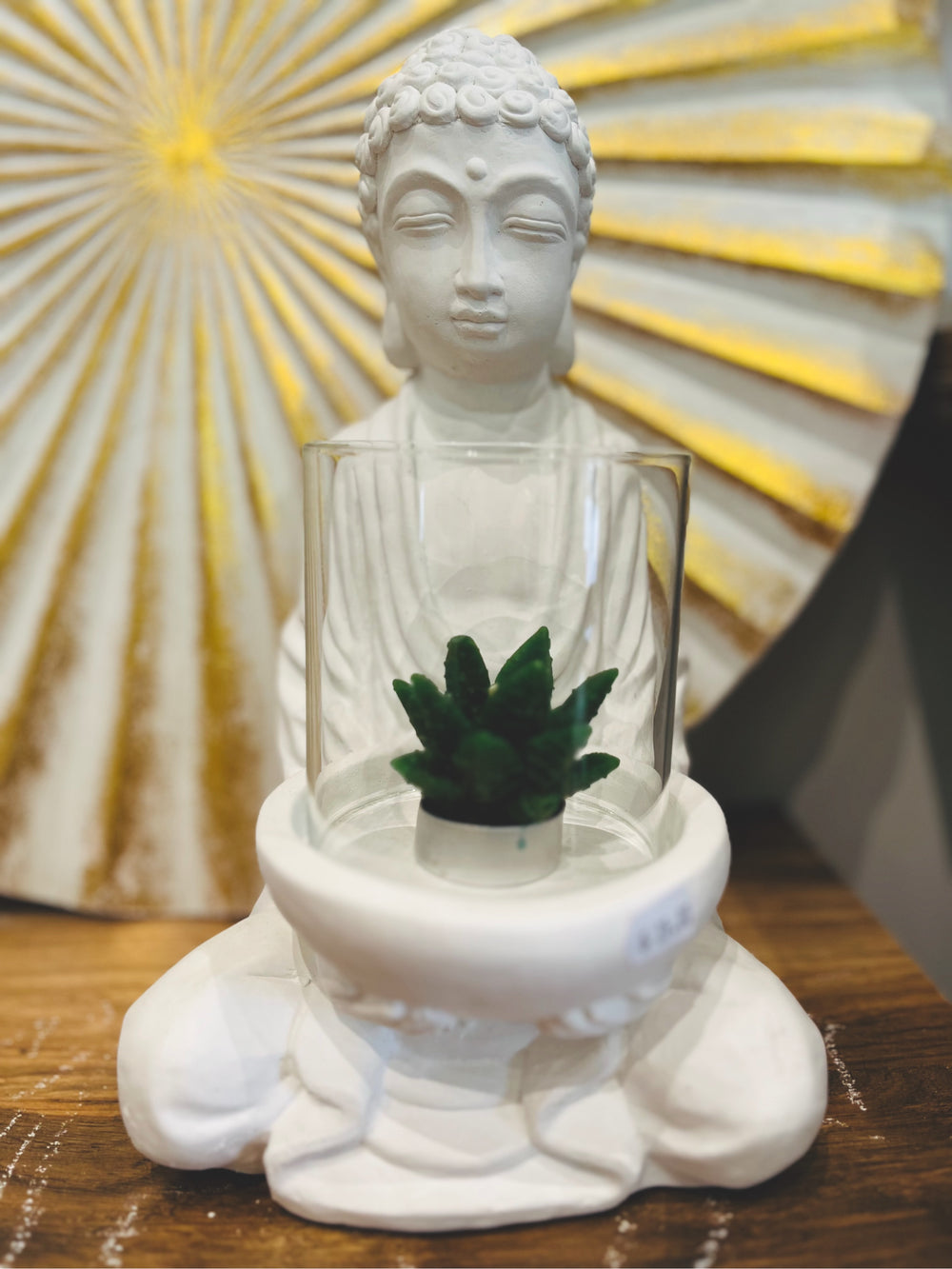 Buddha with glass cable holder in